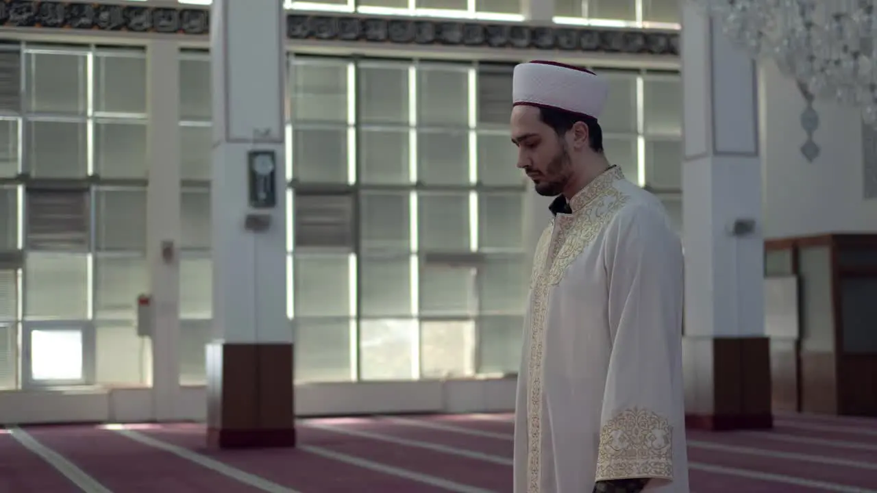 Muslim Imam Praying In The Mosque