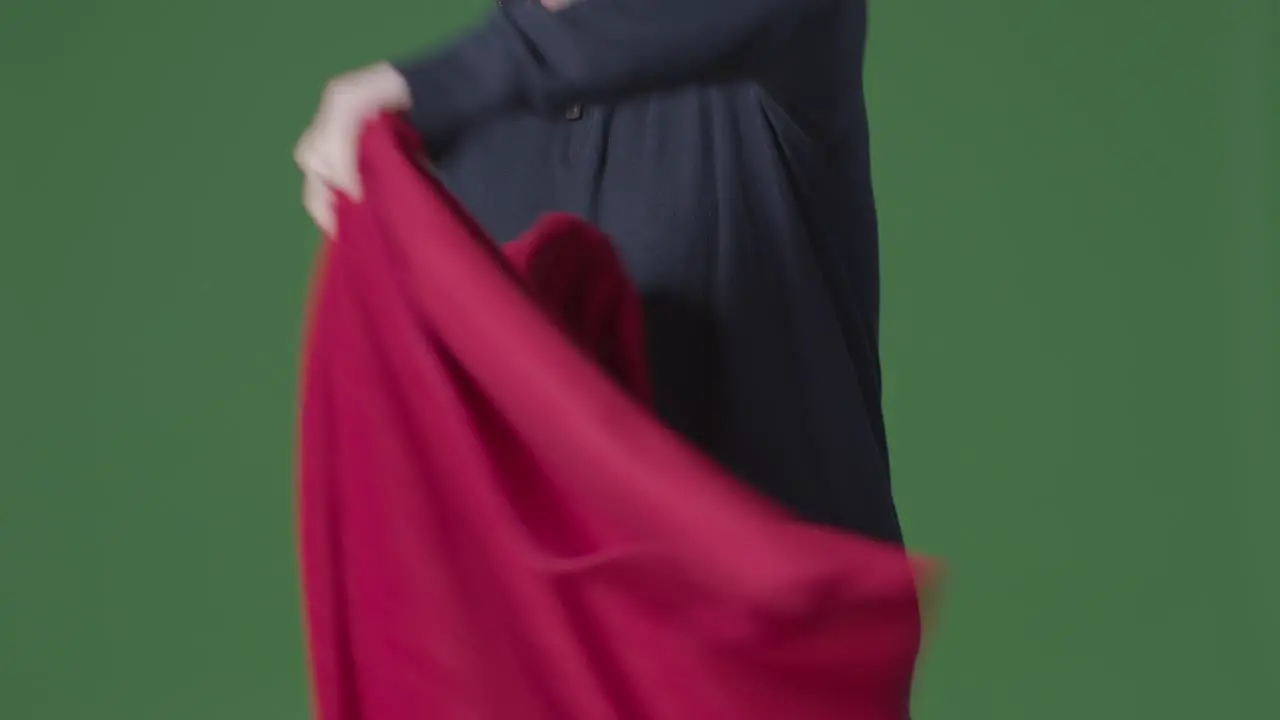 Close Up Of Person Wearing Blanket Trying To Keep Warm In Energy Crisis Against Green Screen