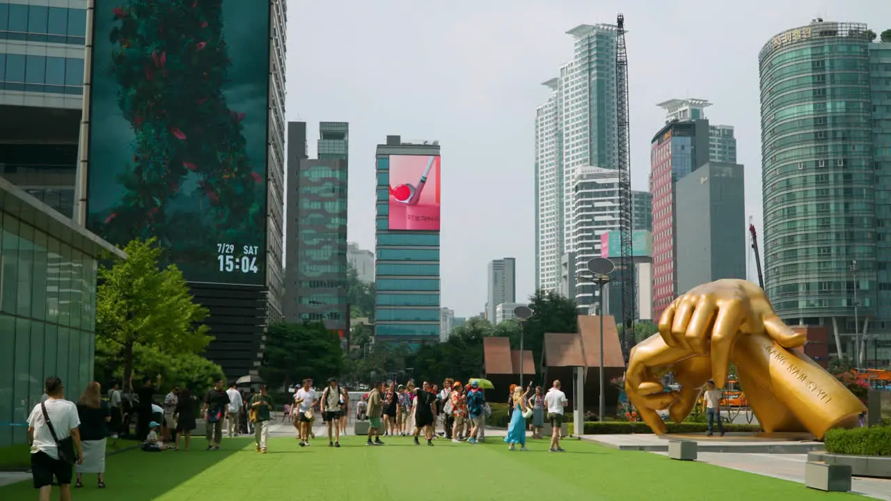 Tourists admire Gangnam Style statue Starfield Coex Mall Trade Center Seoul