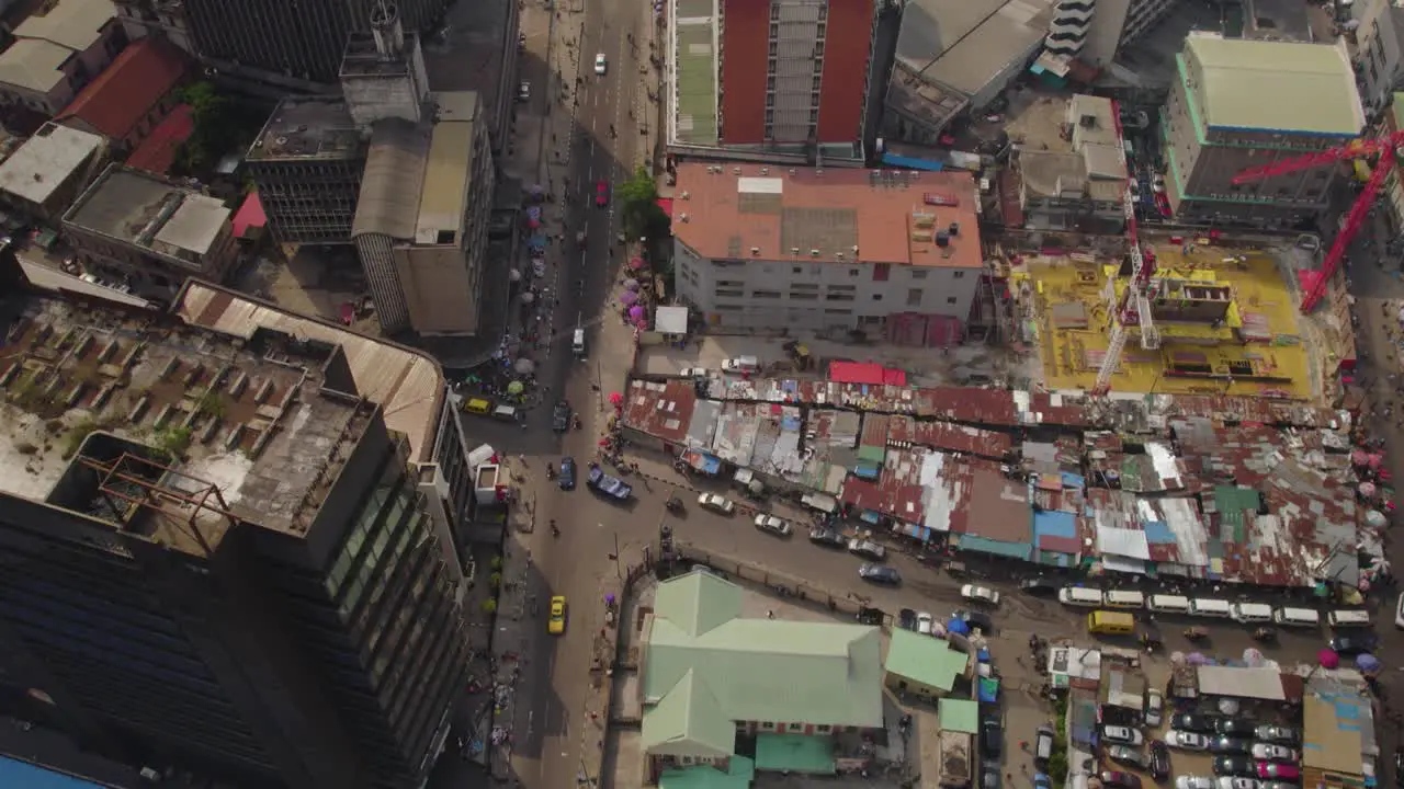 Top down aerial shot of a city with tall buildings in Lagos