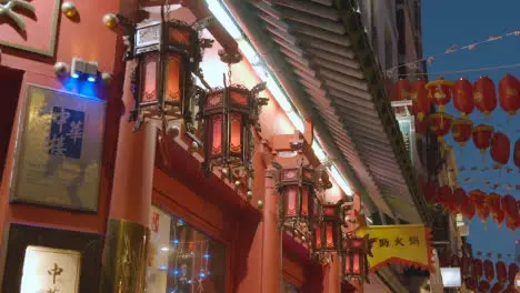 Close Up Of Lanterns Outside Restaurant In Gerrard Street In Chinatown At Dusk In London England UK