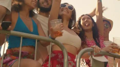 Low Angle Shot of Young Festival Goers at Stage Barrier the Enjoying Music