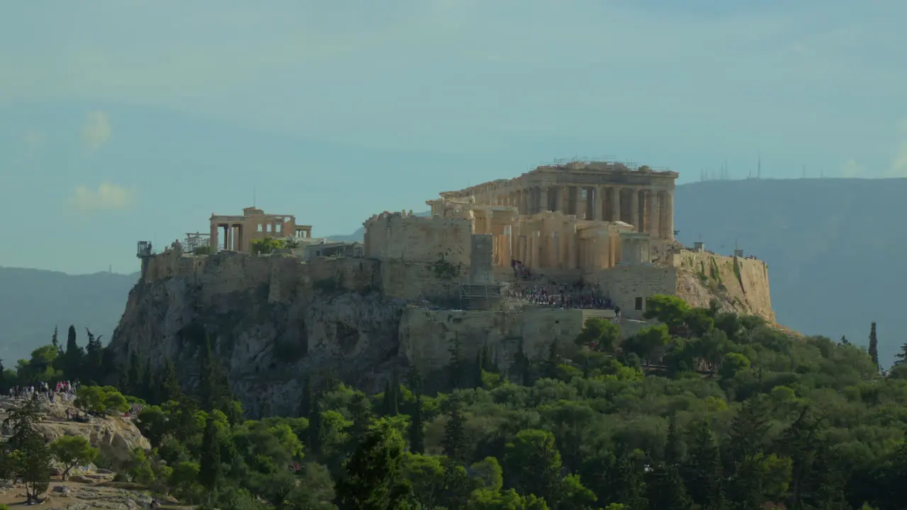 Acropolis of Athens overlooking lush greenery