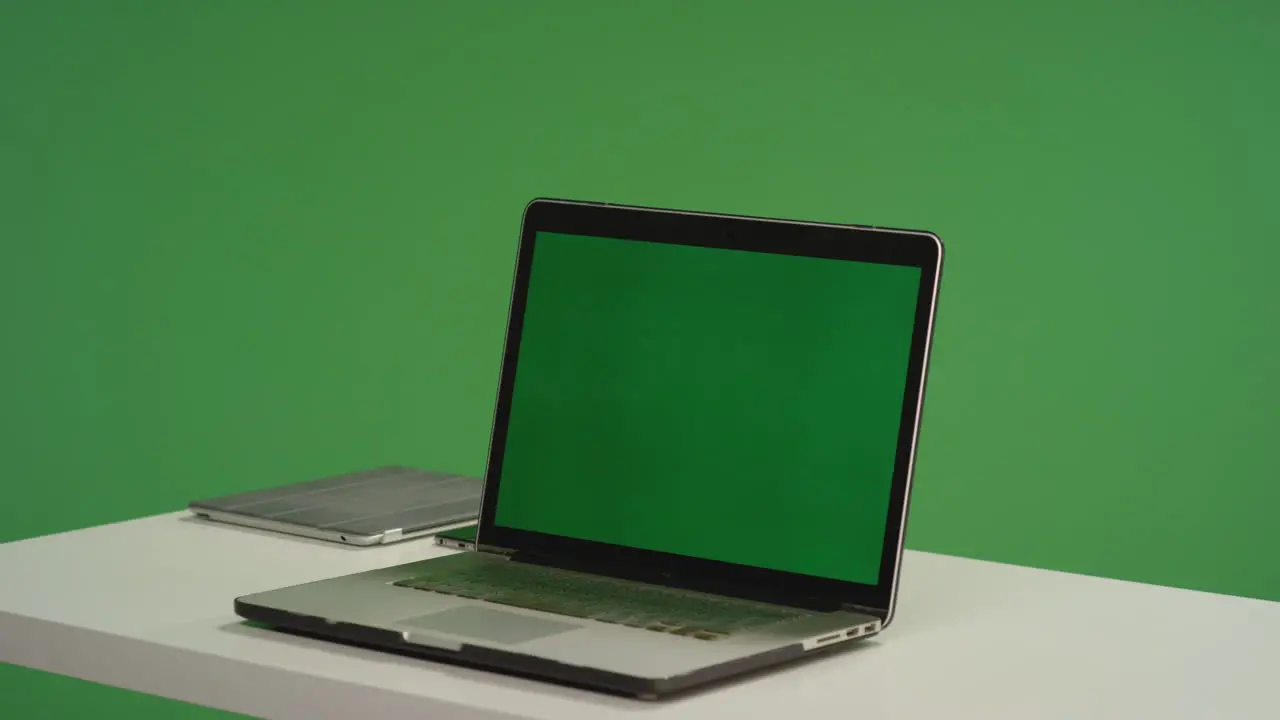 Desk with Laptop on Green Screen