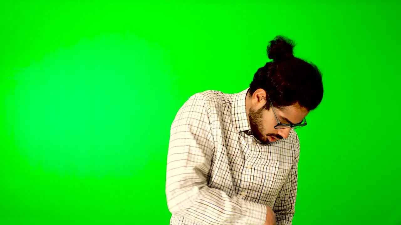 Indian business man using mobile green screen