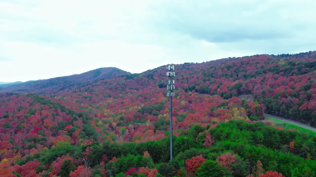 Autumn Spectrum 5G Cell Tower Rising Above Vibrant Fall Foliage