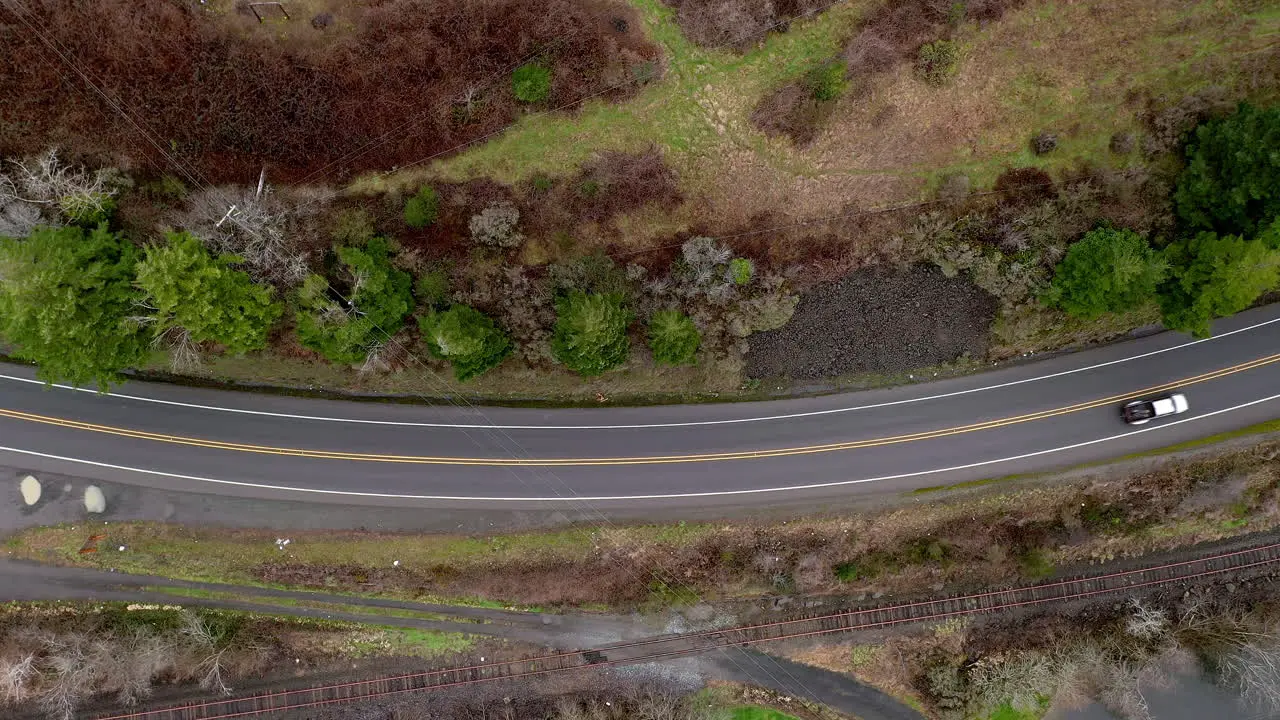 Cars And Trailer Truck Driving On Rural Highway At Daytime