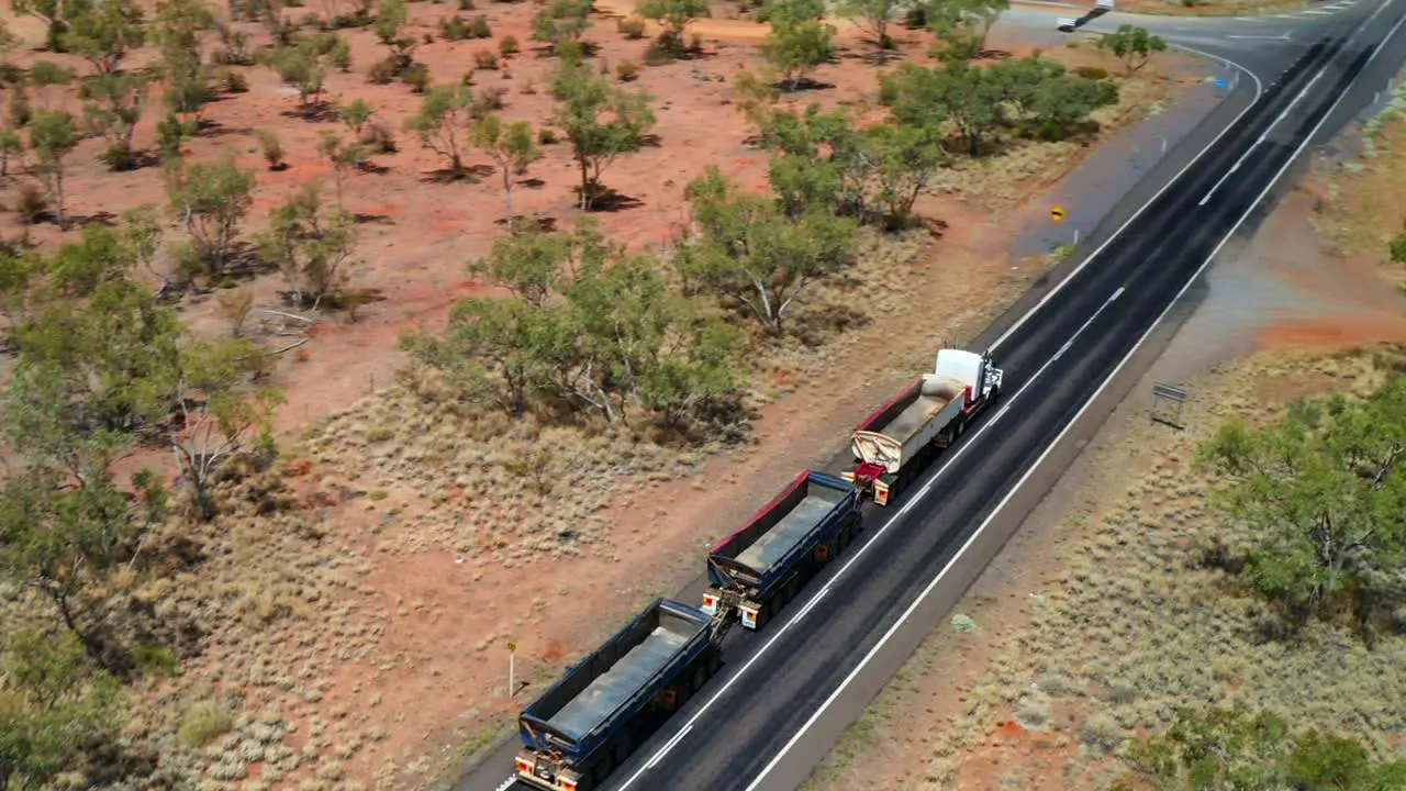 Empty Three-trailer Road Train Driving On The Highway In Queensland Australia