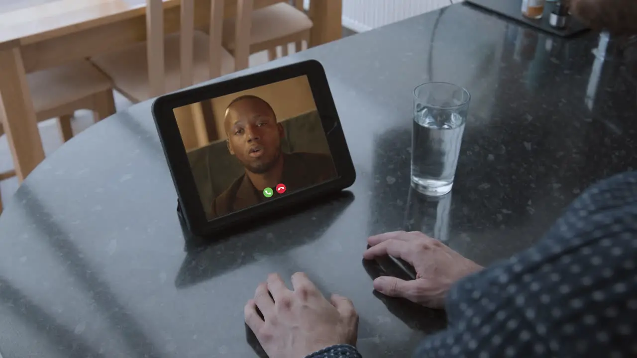 Professional male talking to camera assertively using hand gestures on videocall with overlays