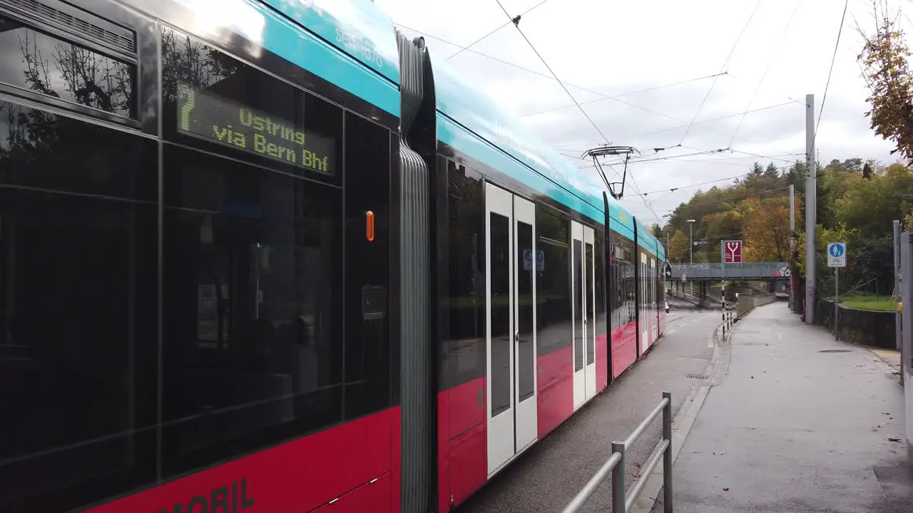 A Red Tram Closeup Traveling Shot in Streets of Bern Switzerland Transportation