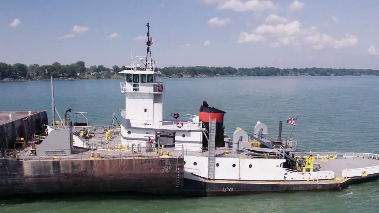 Gravel Ship Traveling Lake Erie With Green Trees At The Waterfront In Ontario Canada