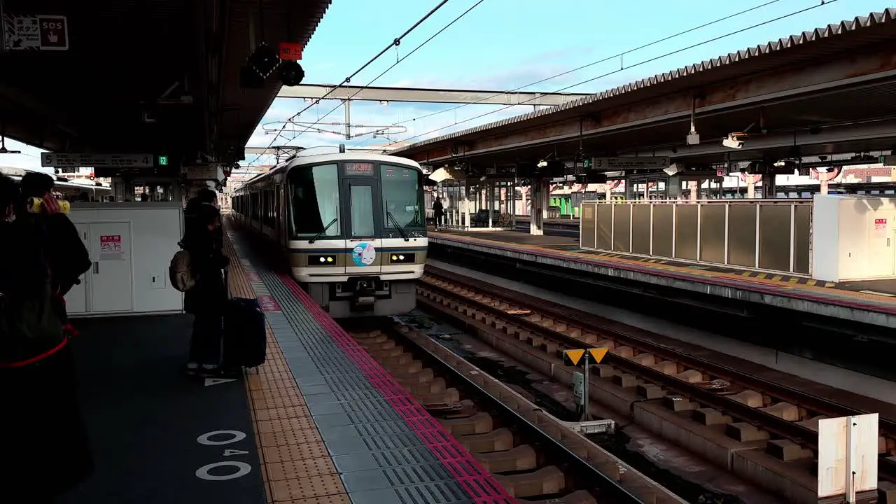 Train Arrives at Platform People Waiting Nara Japan