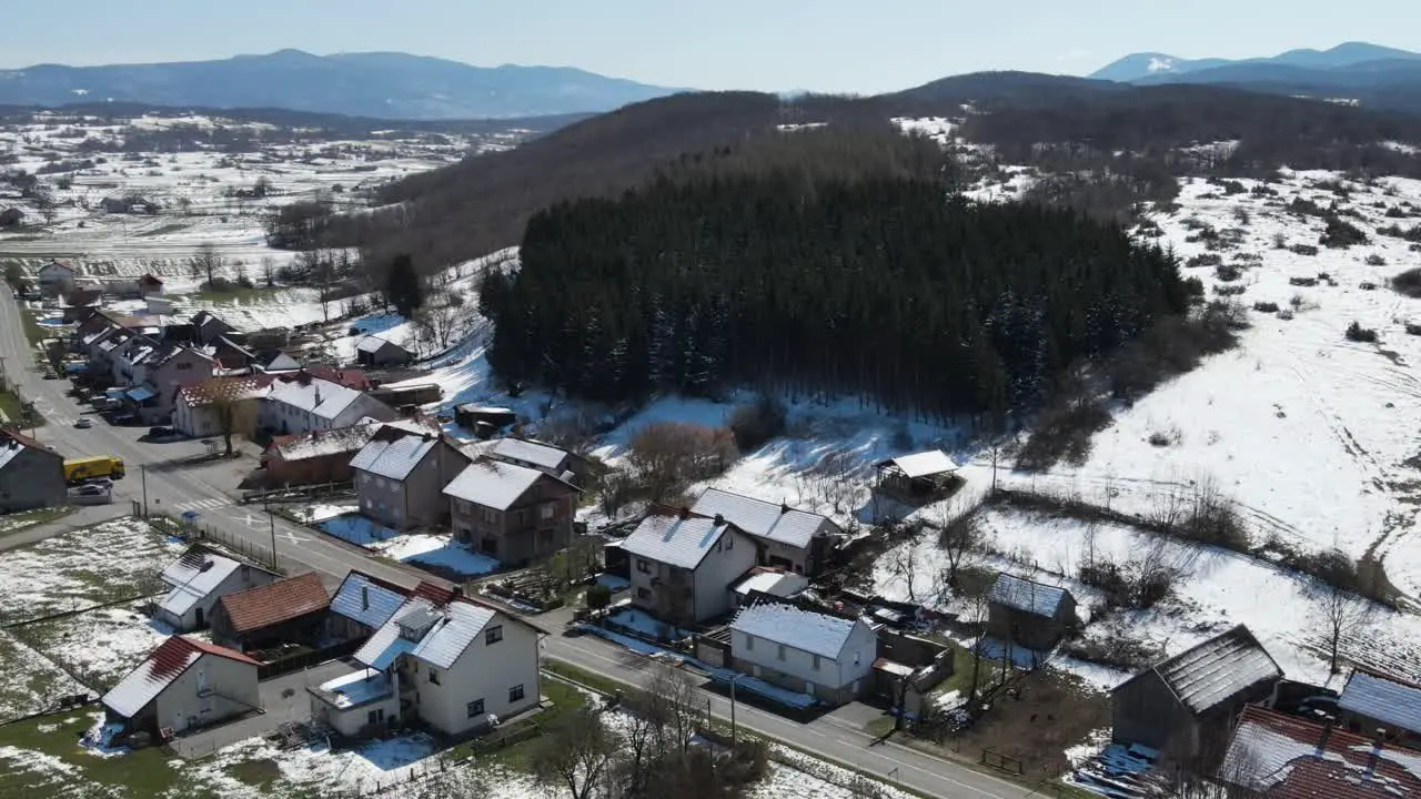 An aerial circular panorama of Krizopolje in Lika county Croatia with the view on highway with a loop and toll boot