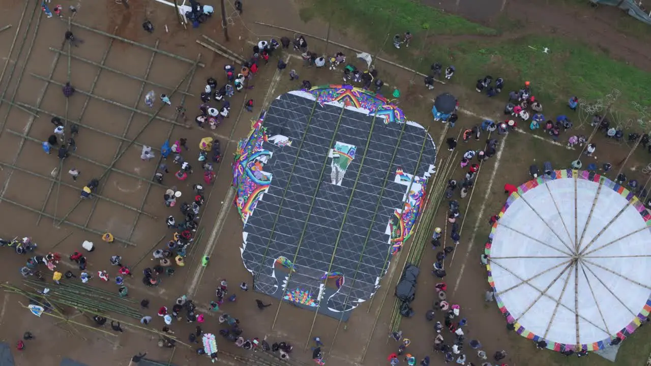 People waiting for launch of giant kite at Sumpango Kite Festival aerial