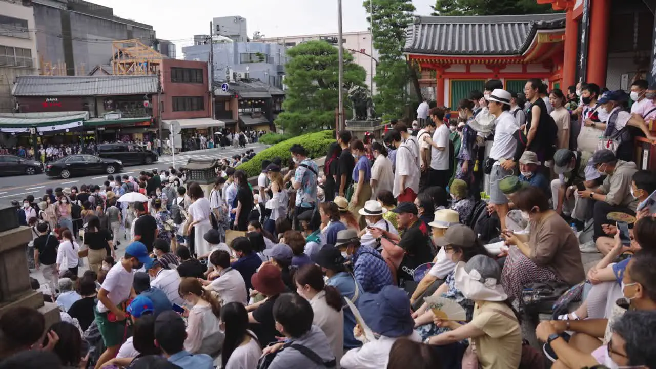 Gion Matsuri Begins after 2 year break Crowds of People waiting at Shrine