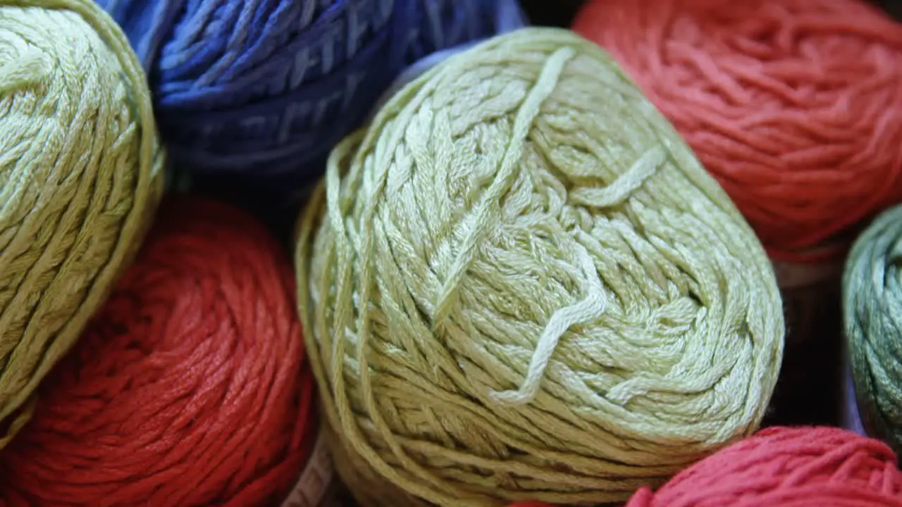 Bunches of different coloured woollen yarn 4k