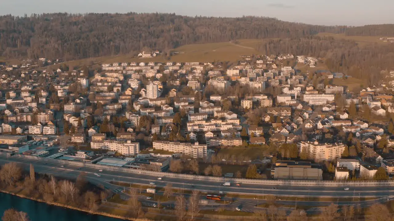 urban settlement with a highway in front and a river