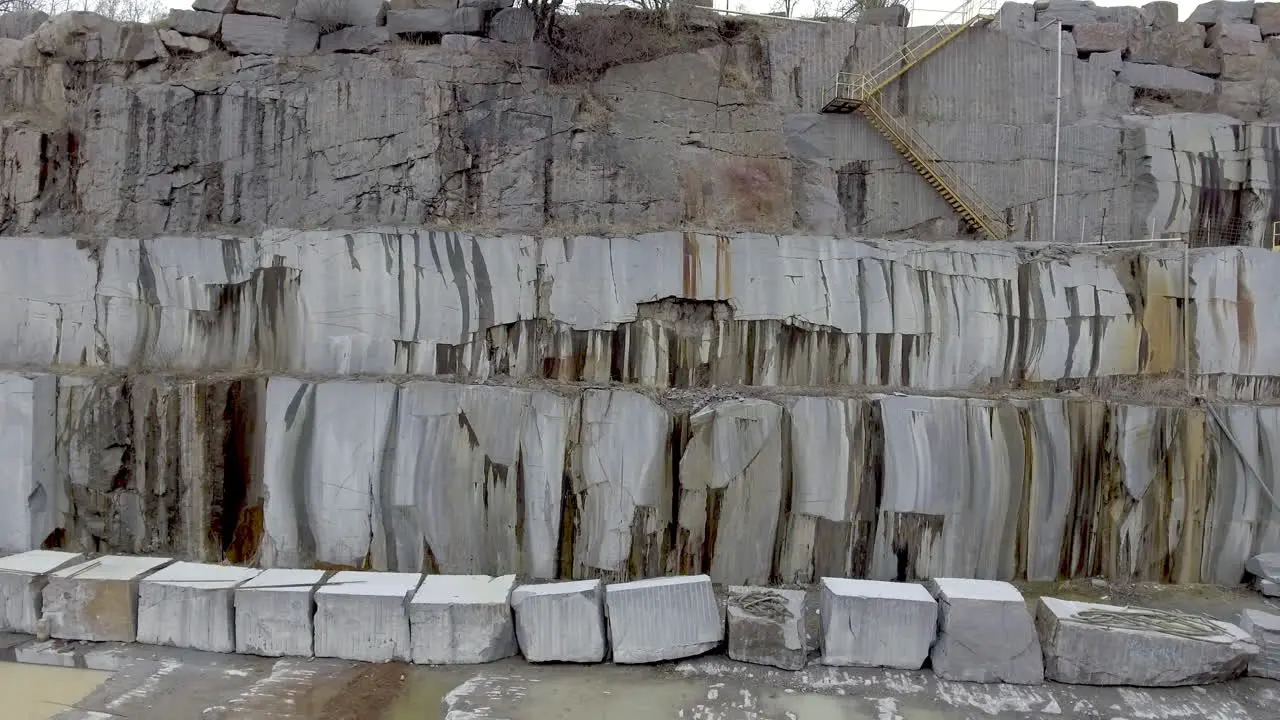 Slow camera dolly of granite quarry stone slabs