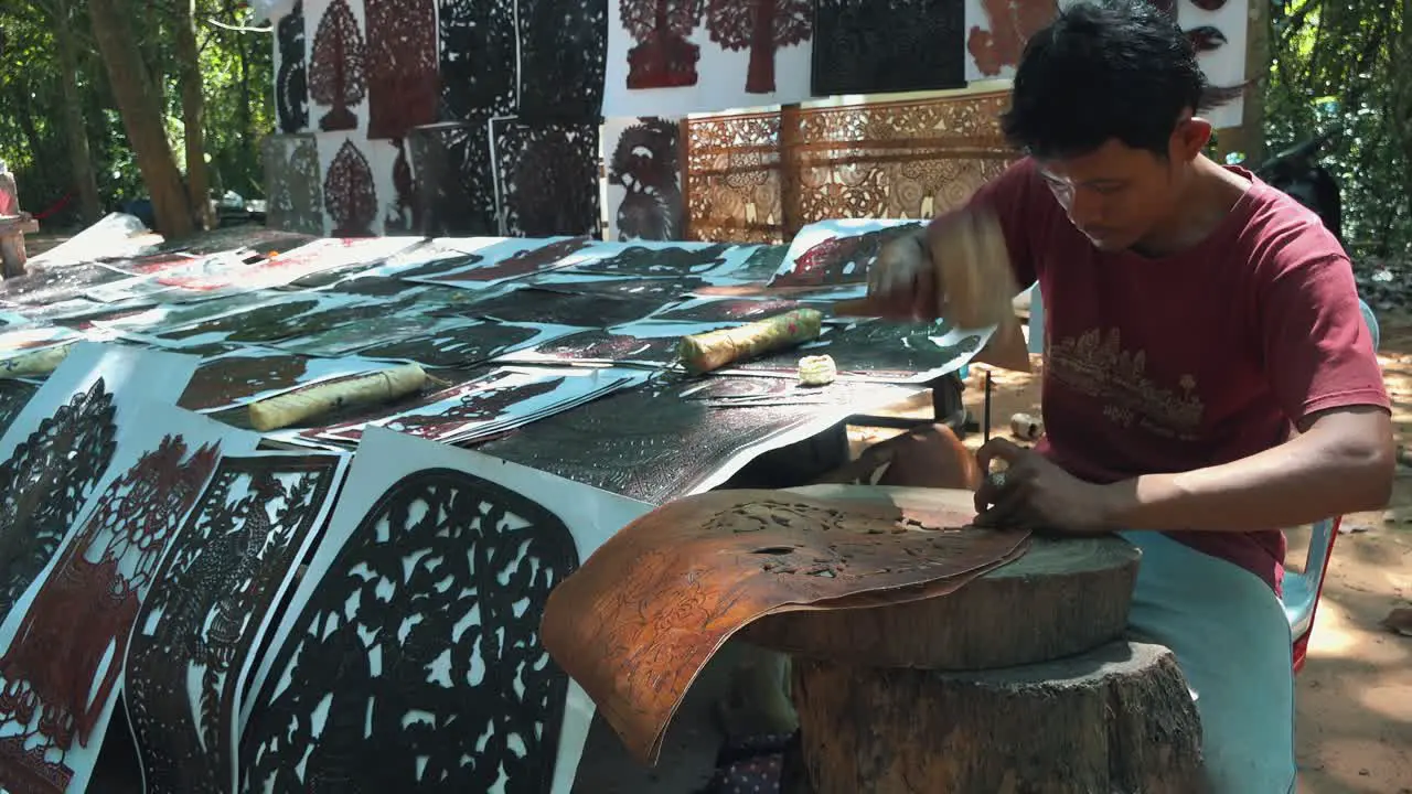 Cambodian Artist Near Angkor Wat Using Stencils to Decorate Leather