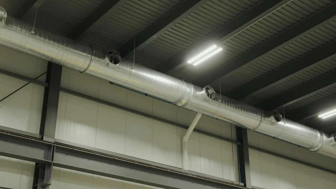 HVAC heating and cooling piping throughout the ceiling of an commercial building