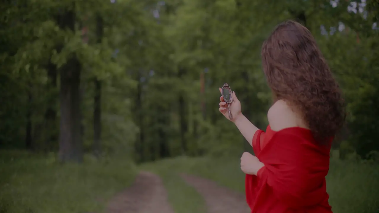 Woman Looking in Mirror Forest