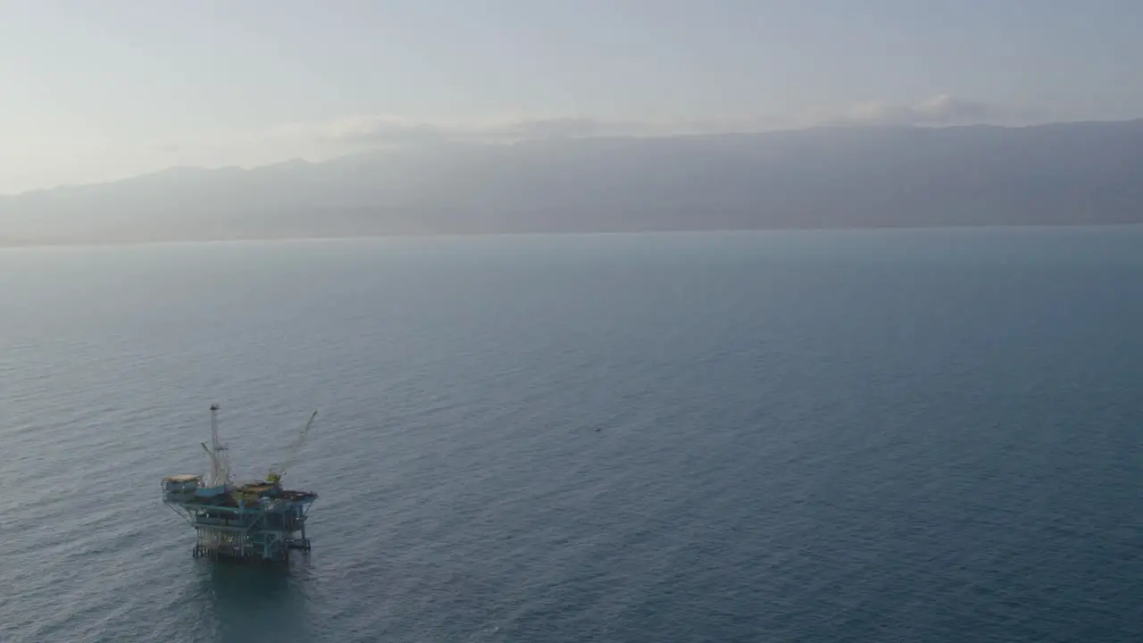 An aerial shot over oil derricks and platforms in the Santa Barbara Channel California 1