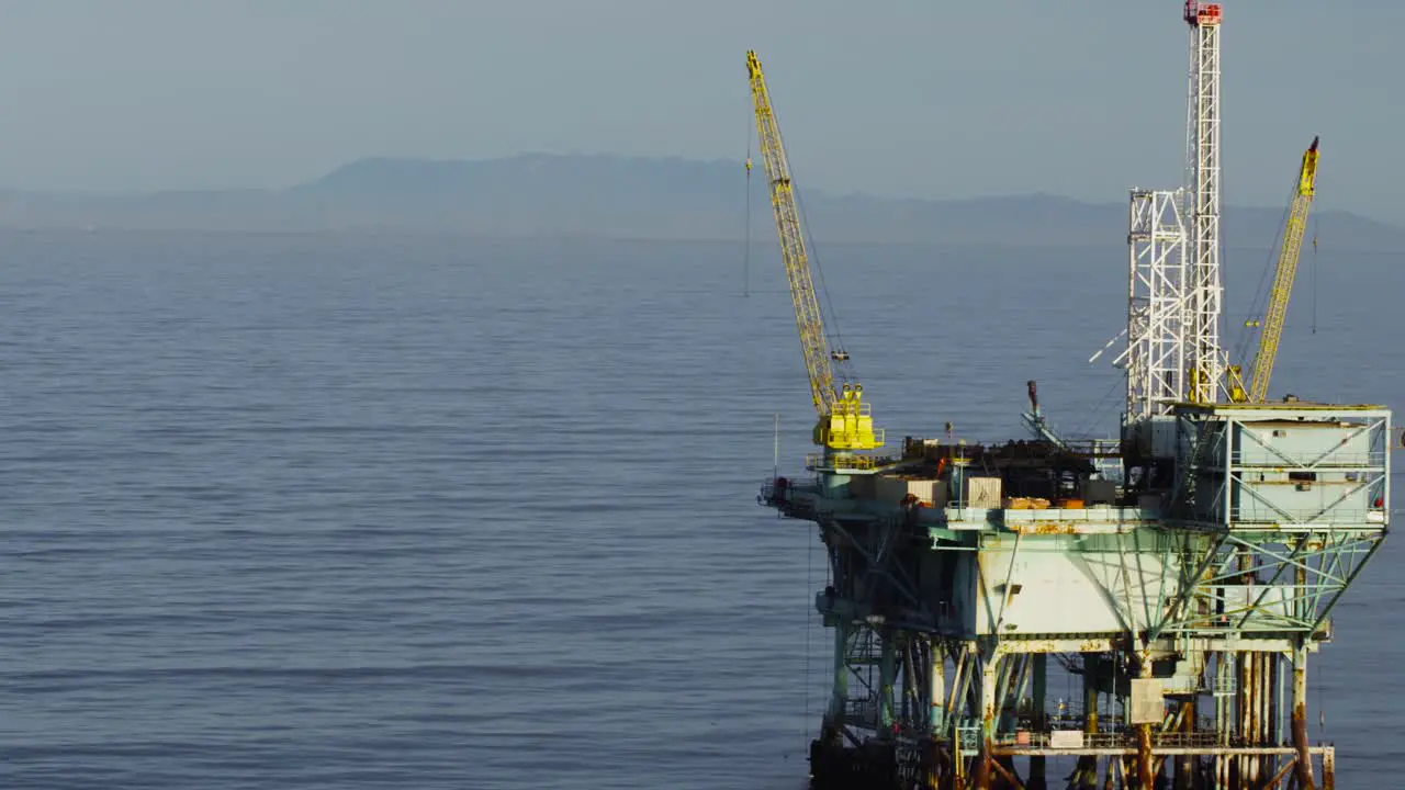 A beautiful aerial shot over oil derricks and platforms in the Santa Barbara Channel California 3