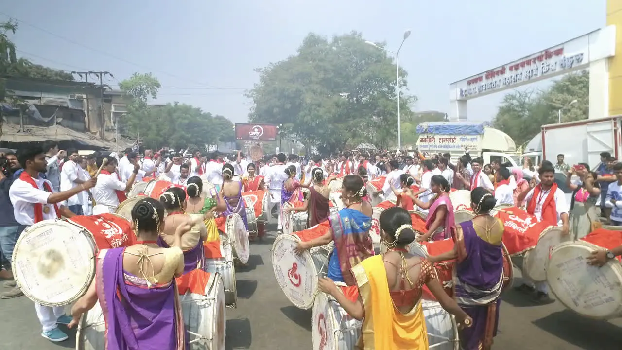 People of India in Maharastra state celebrating the traditional festivals by playing dhol tasha which is drums and gongs