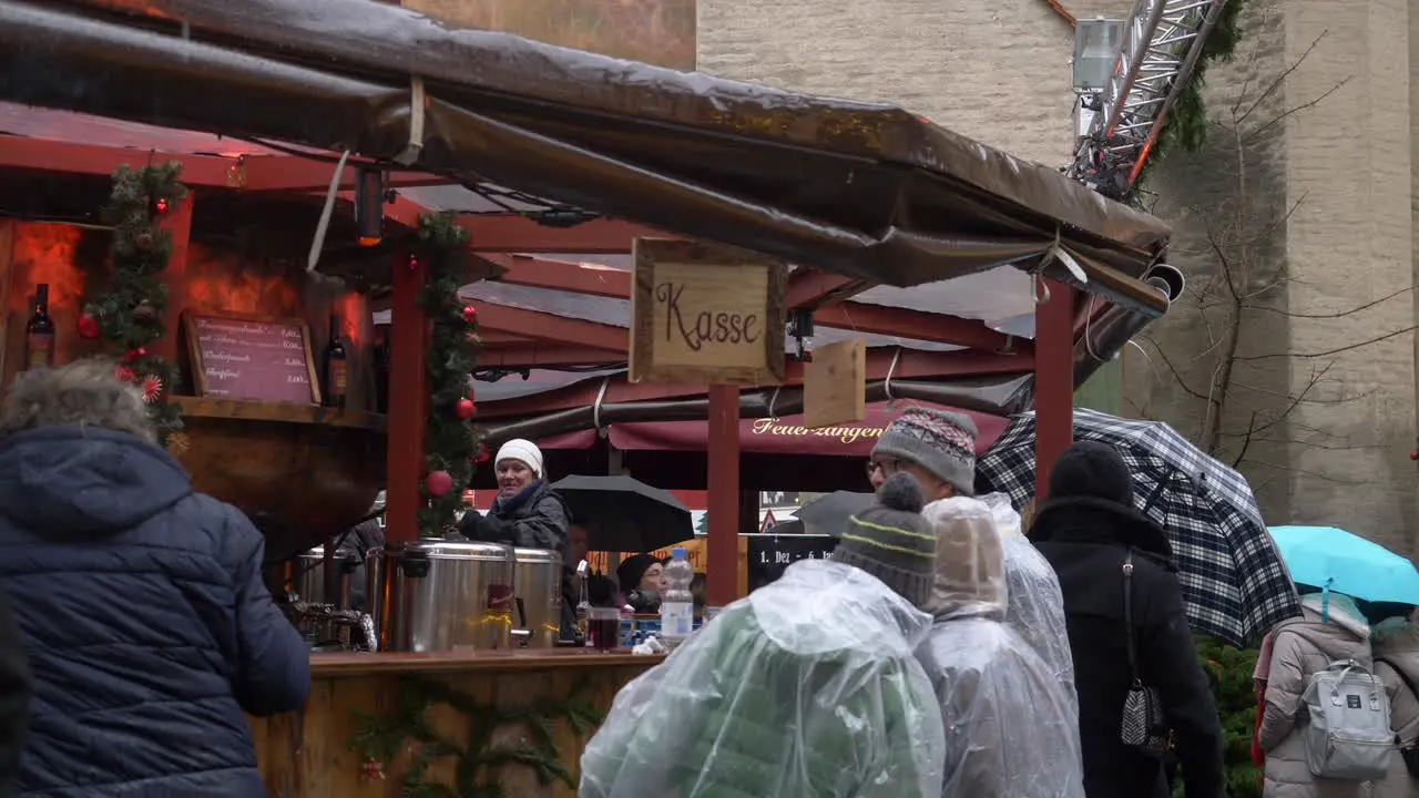 People ordering food and drinks at the Munich christmas market