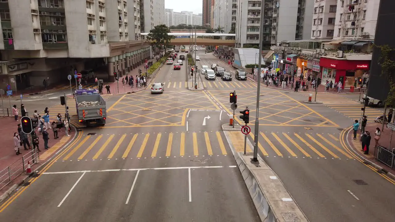 People crossing the street in Downtown Hong Kong Aerial view