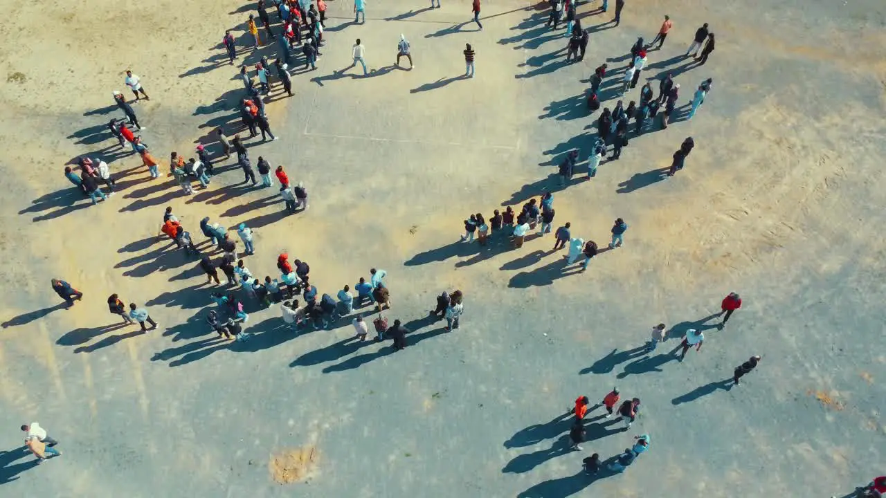 A group of Nepali Immigrants play a volleyball match in the countryside