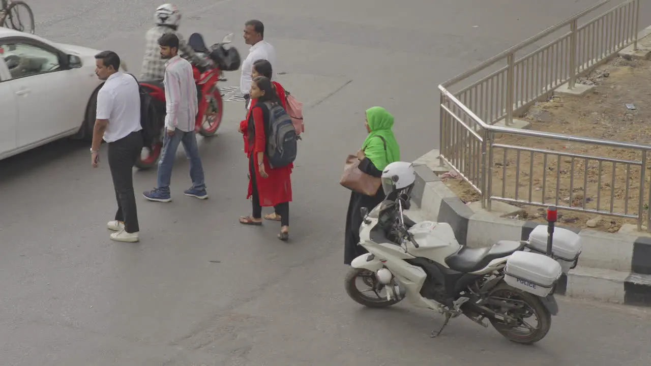 Unsafe crossing of busy street-Dhaka city people crossing road 4k ProRes HQ