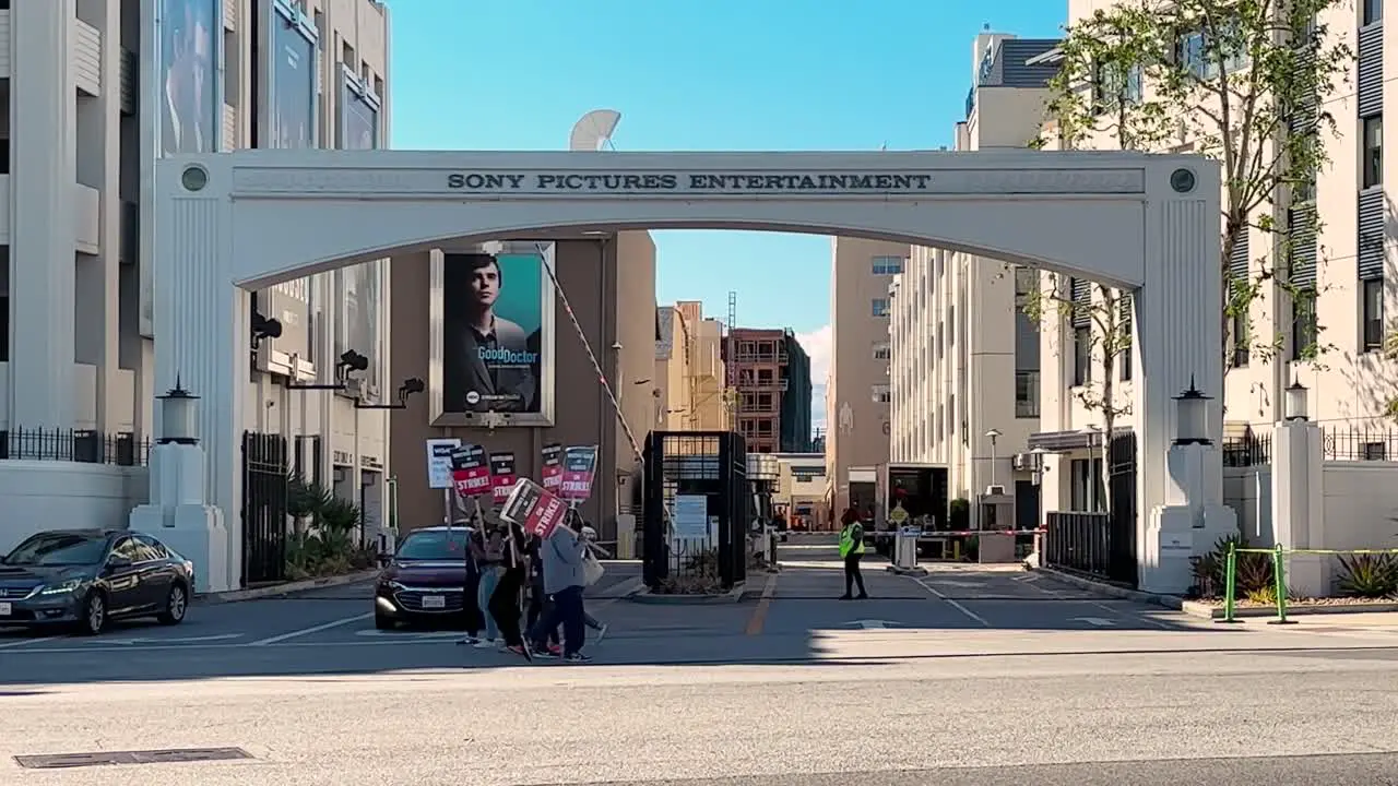 Writers Guild of America striking in front of Sony Pictures WGA people with Pickett signs