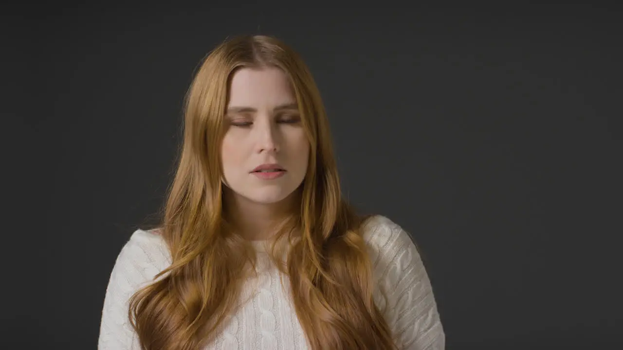 Mid Shot of Young Woman Looking Angry