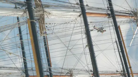 Vertical Low Angle Shot of Person Maintaining Old Cutty Sark Ship