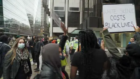 London Police Officers Walking Amongst Protesters