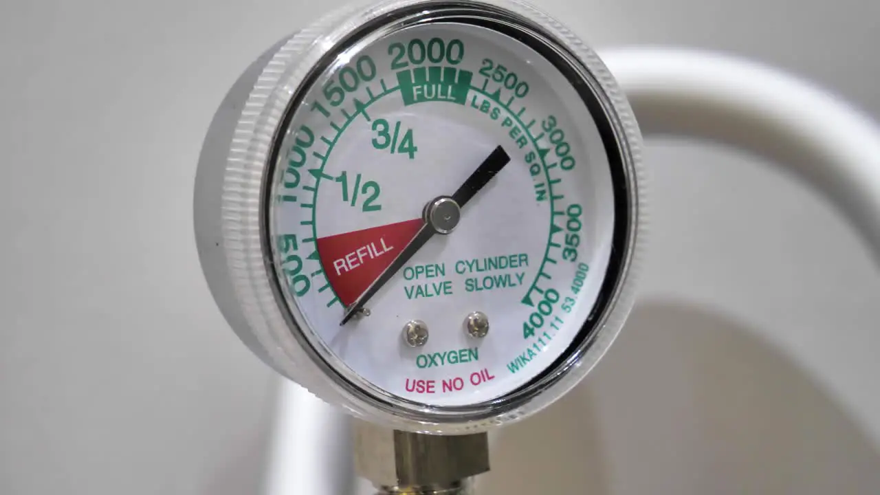 Slow motion close-up shot of an oxygen pressure gauge on a colonic hydrotherapy machine