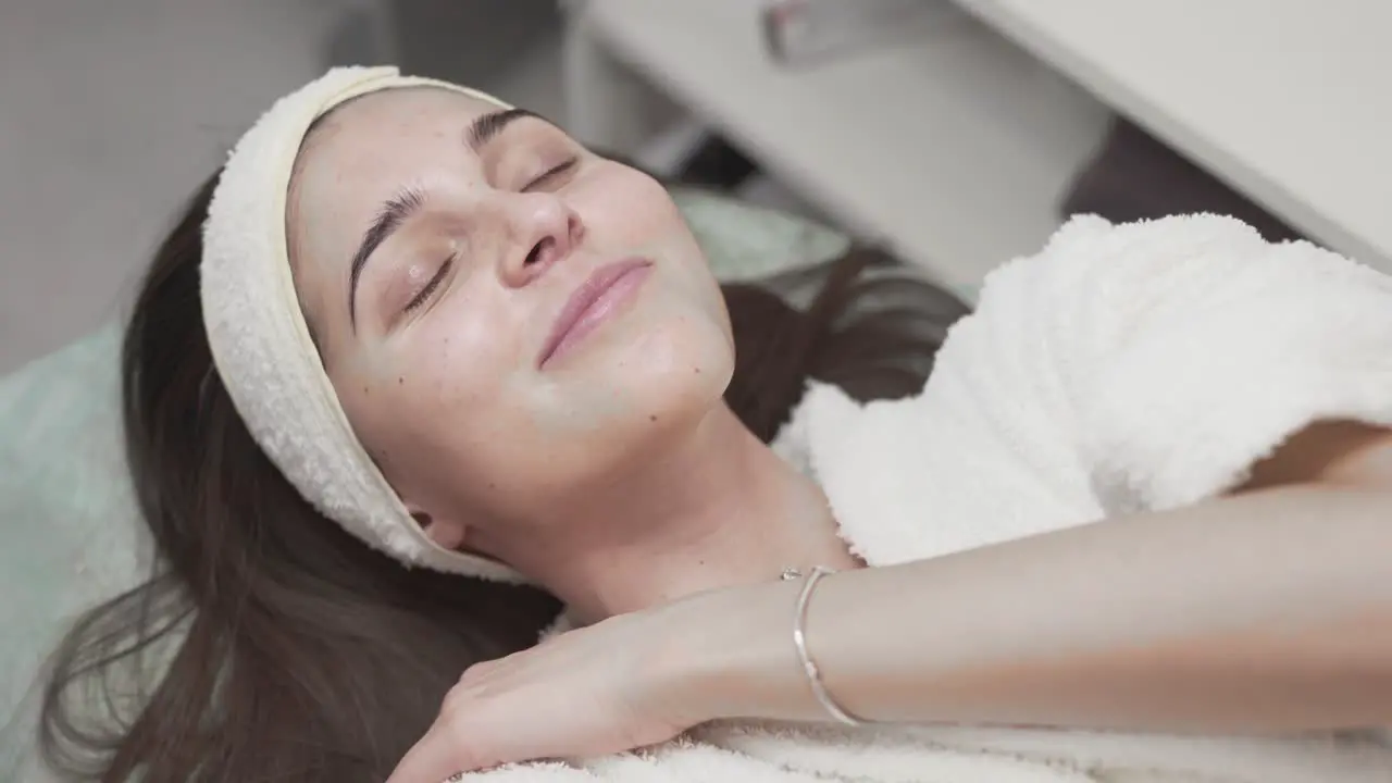 Girl relaxing and having fun at the spa