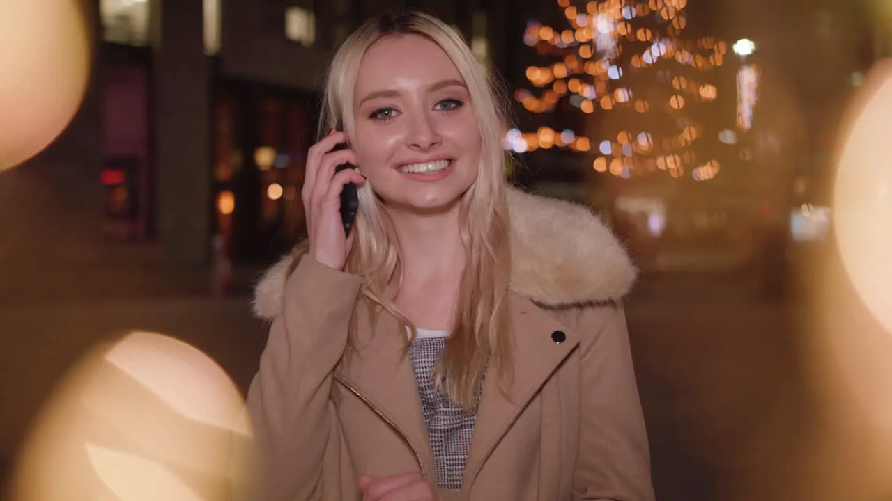 Young Woman Gets a Special Christmas Phone Call From a Close Friend In Slowmotion