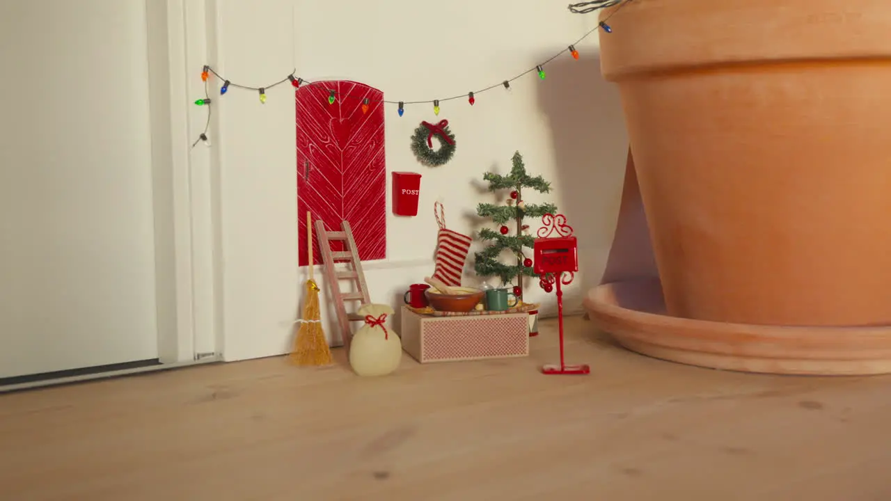 Cute Nisse door scene with festive Christmas decorations