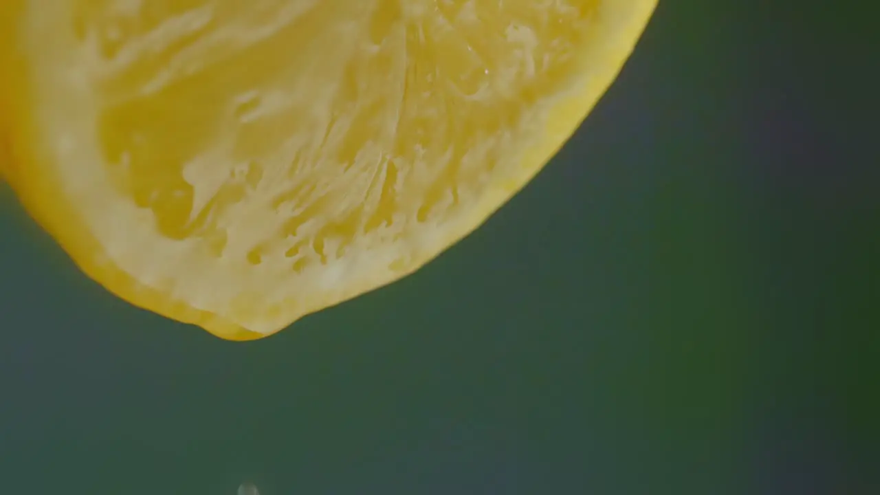 Juice Drips From Sliced Lemon