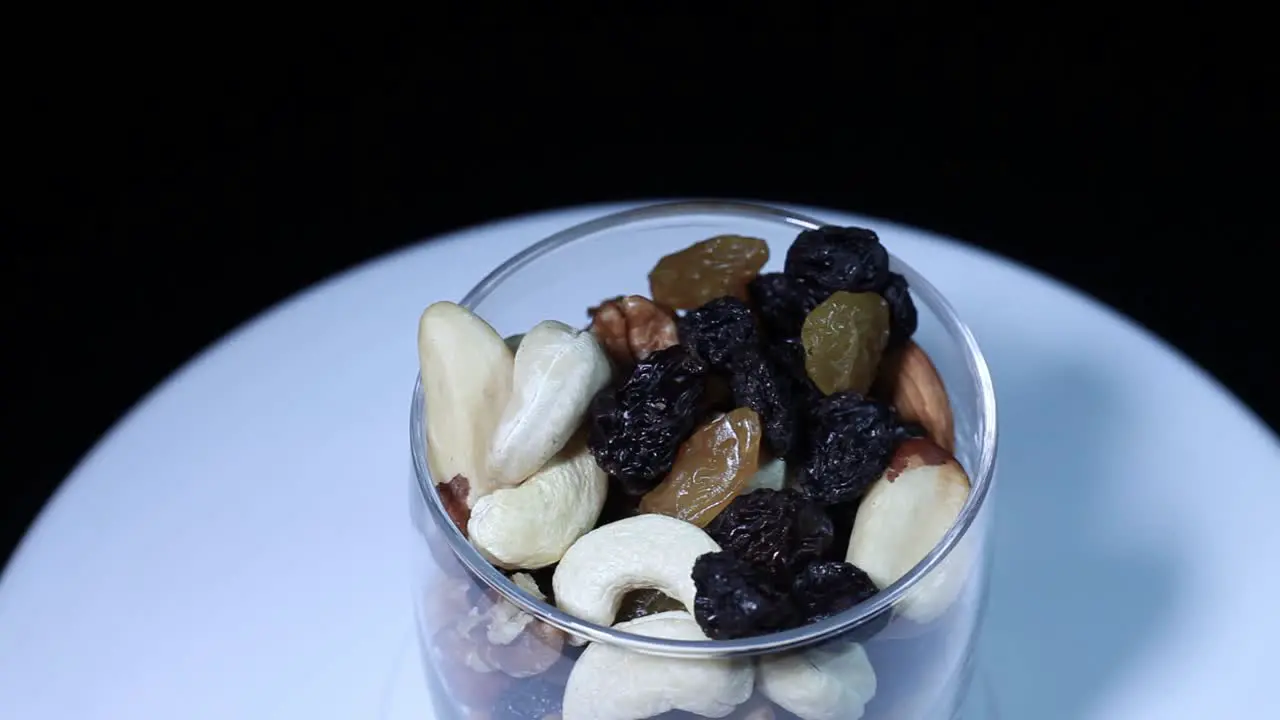 Nuts with raisins in a glass