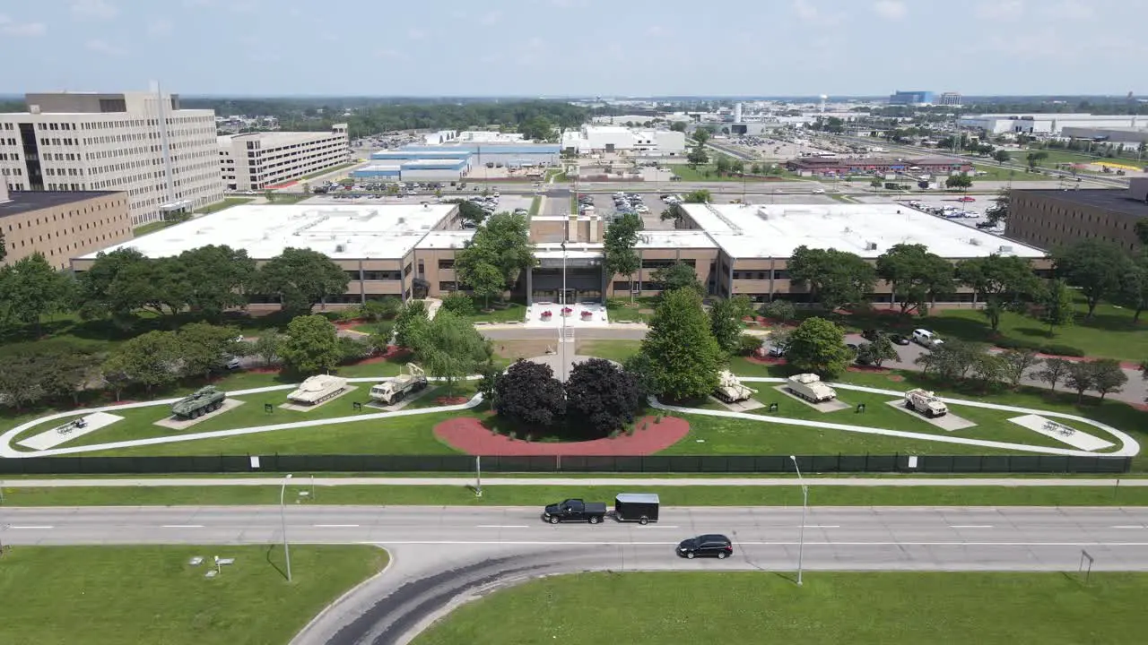 Aerial Ascending backwards shot from the Detroit Arsenal built tanks and armored vehicles in Warren Michigan USA