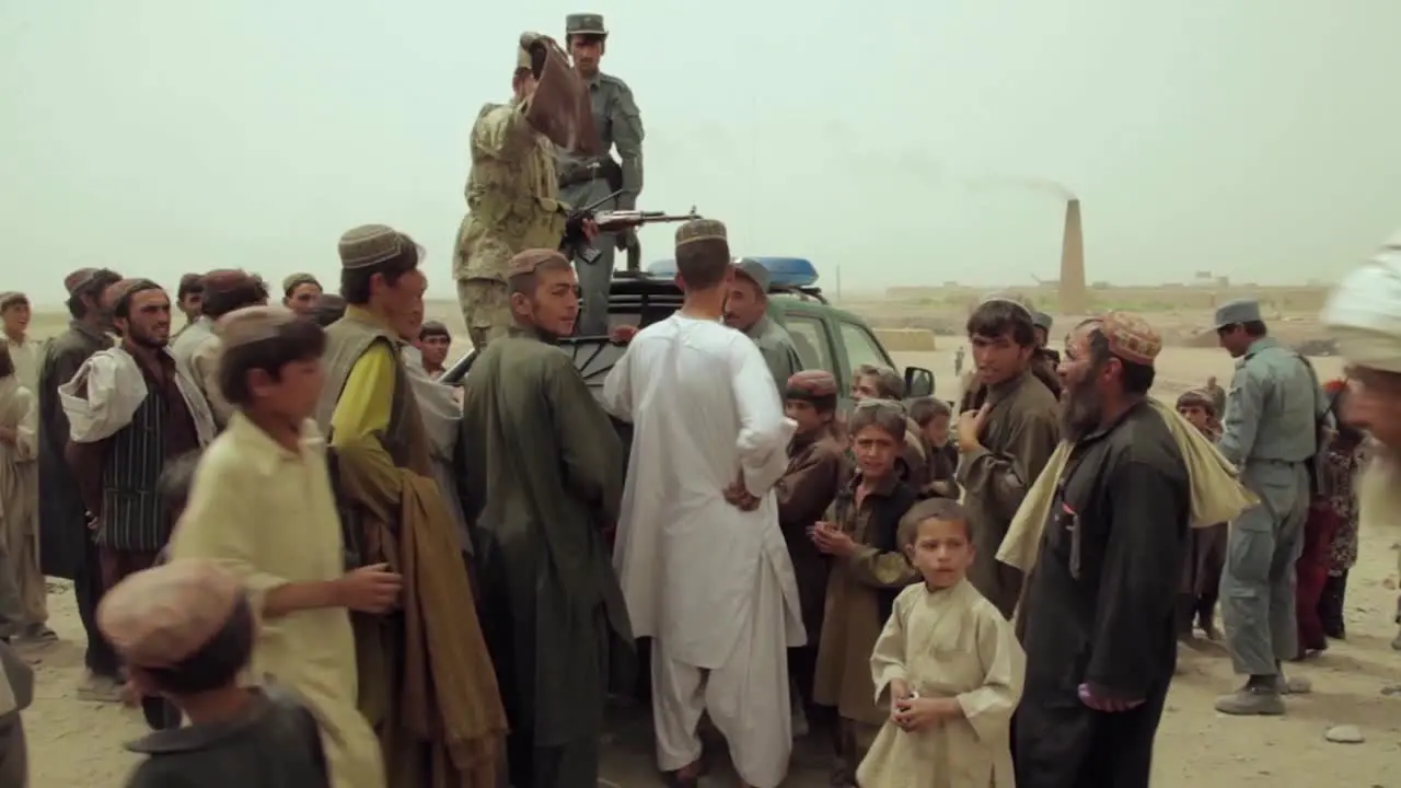 Afghan Soldiers Hand Out Toys Shoes Clothes And Gifts To Villagers In Afghanistan 1