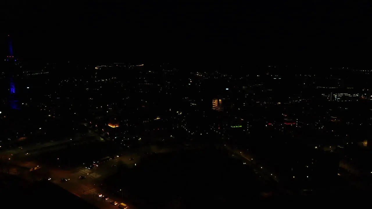 Night aerial drone view of Elisa communication tower in Pasila Helsinki Finland