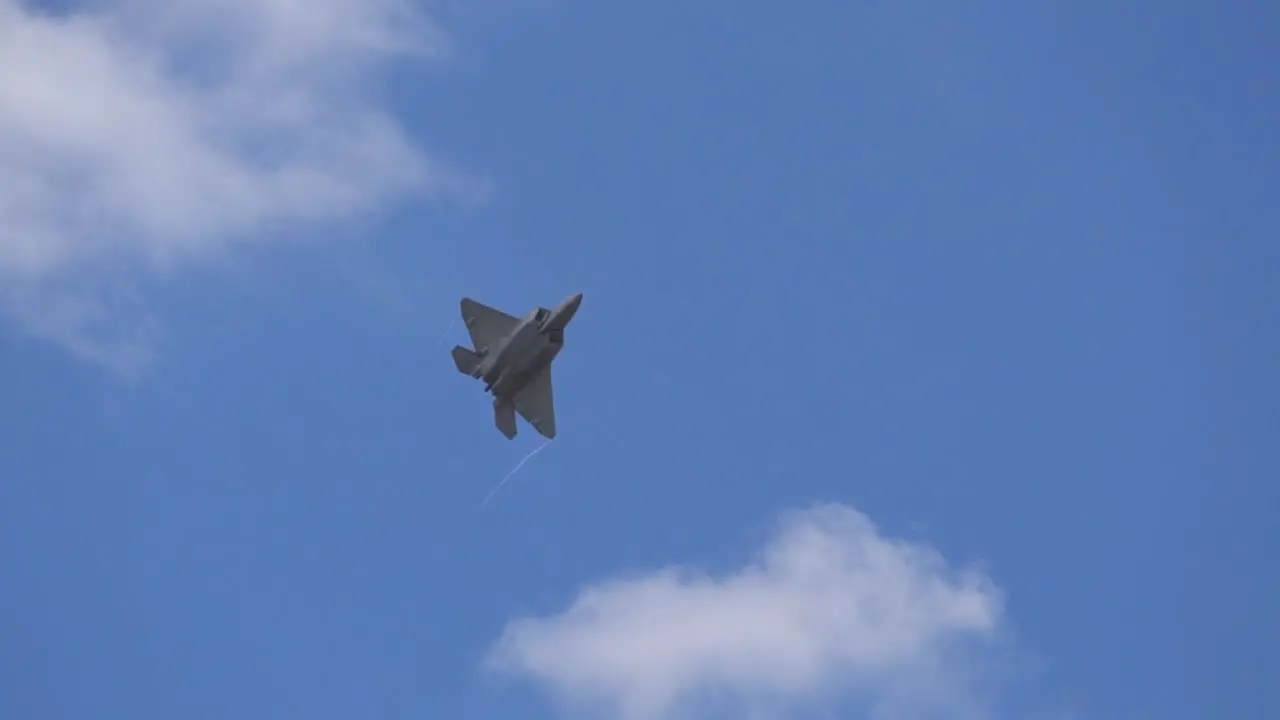 A United States Air Force F-22 Raptor flies by during the Wings over Houston Airshow in 2021