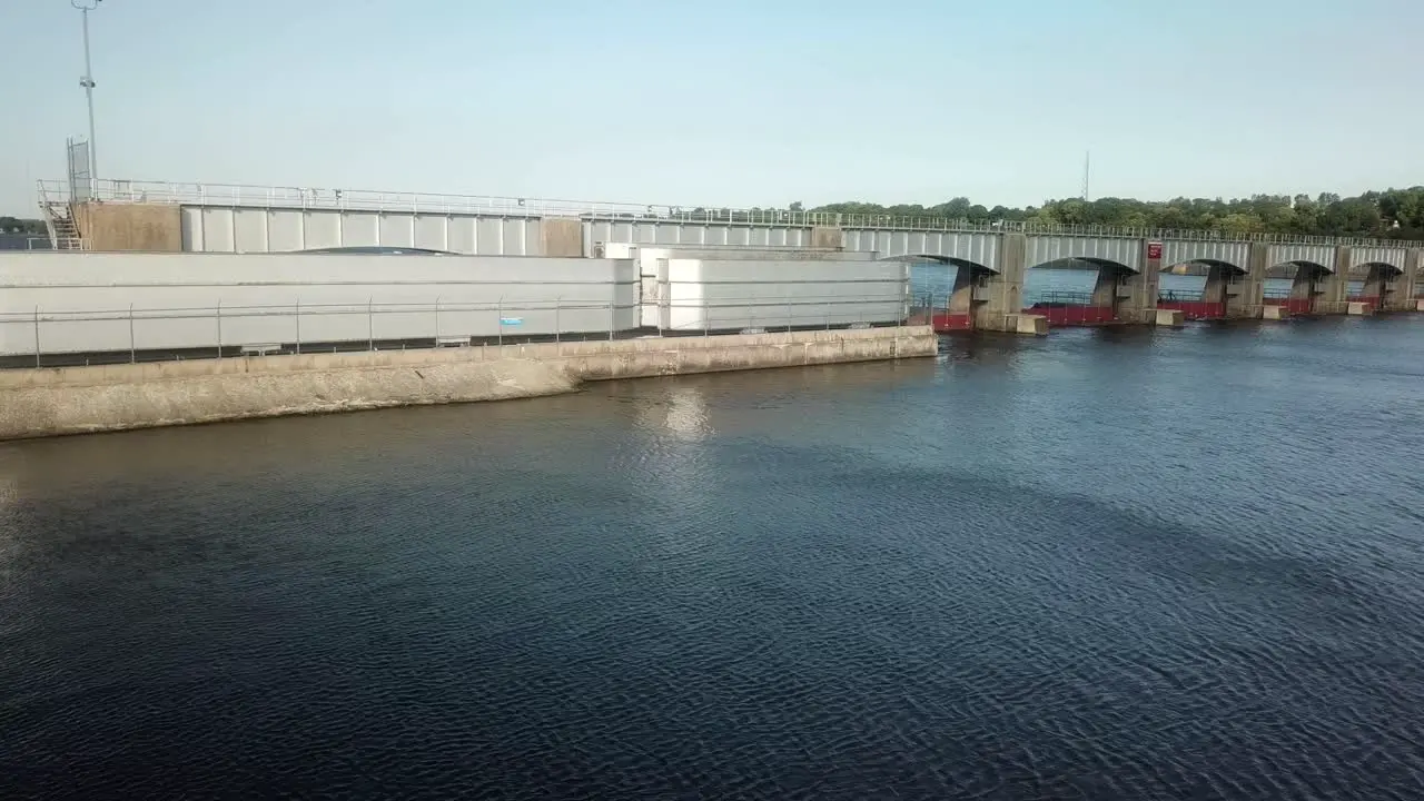 Wide aerial view along Dam 14 on the Mississippi River on a sunny summer day near Hampton Illinois