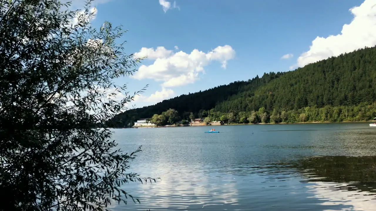 Clip of the Pancharevo lake during a sunny day with a kayak sailing