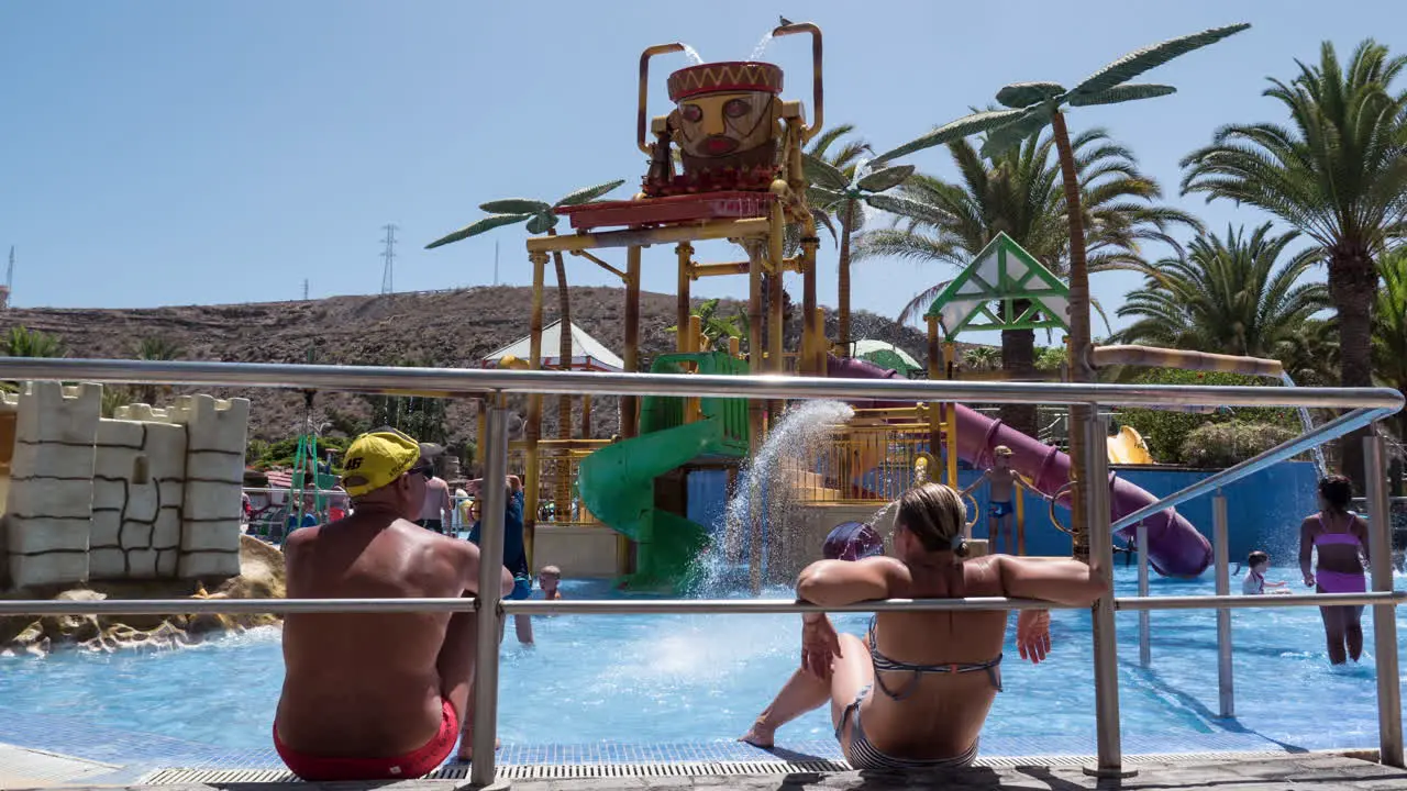 Timelapse of children at outdoor water attraction