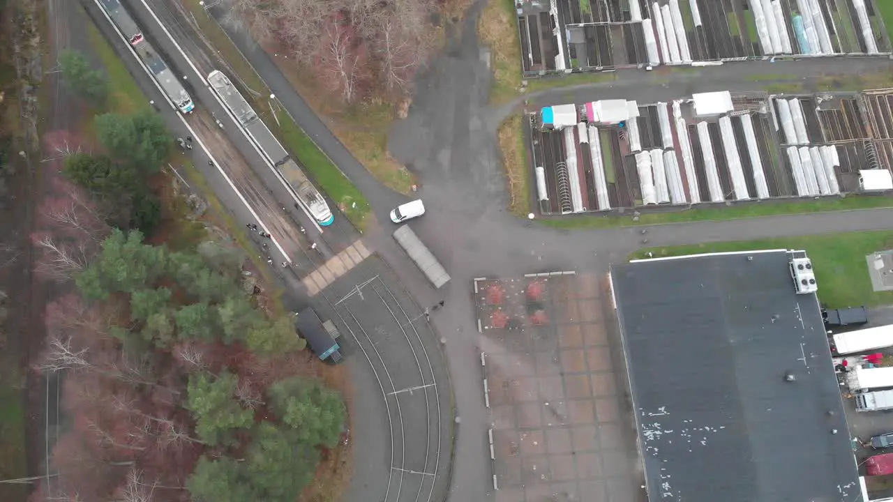 Aerial view of travelers at a tram station in Gothenburg Sweden